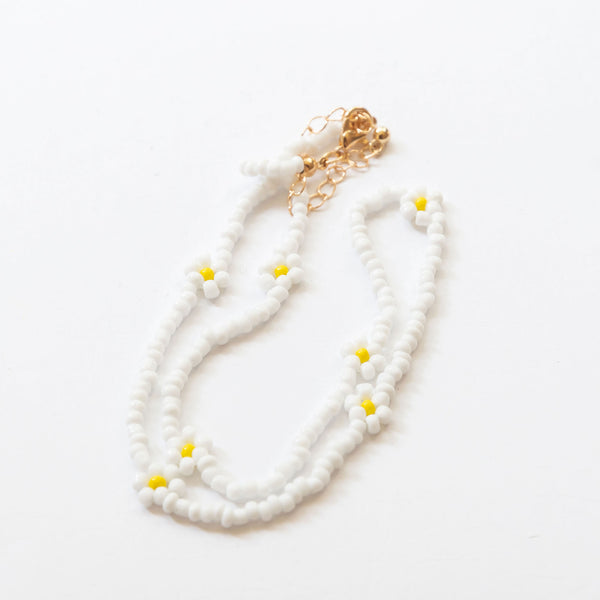 beaded necklace with white flowers