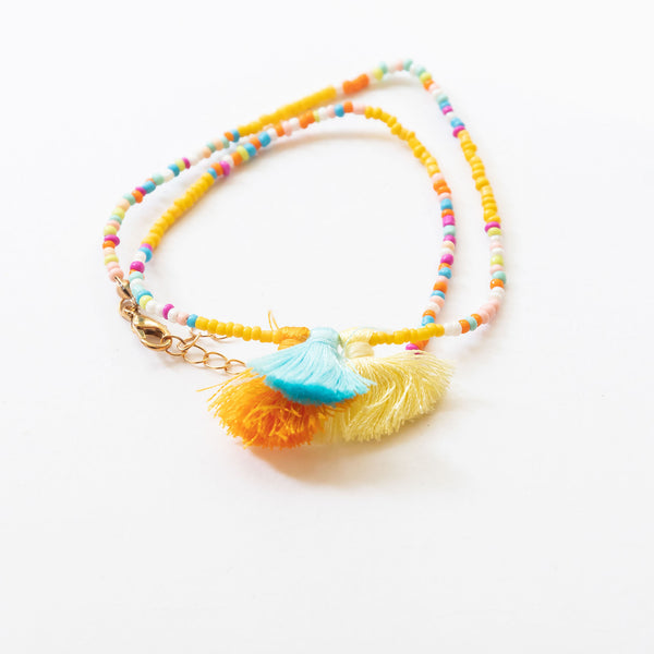 beaded necklace with 3 mini tassels