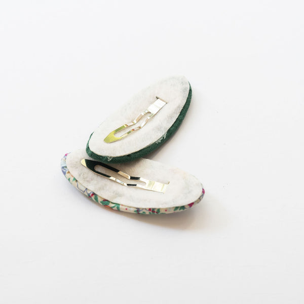 back side of oval hair snap clips