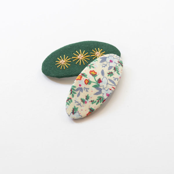 hair clips with green oval flower pattern