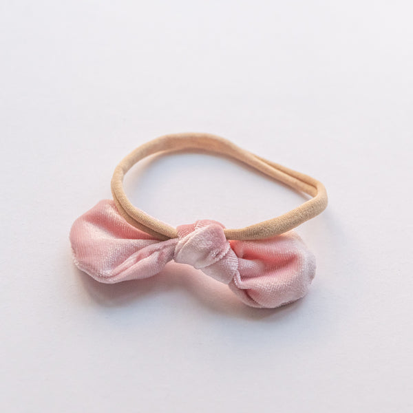 light pink bow elastic headband made of velvet
