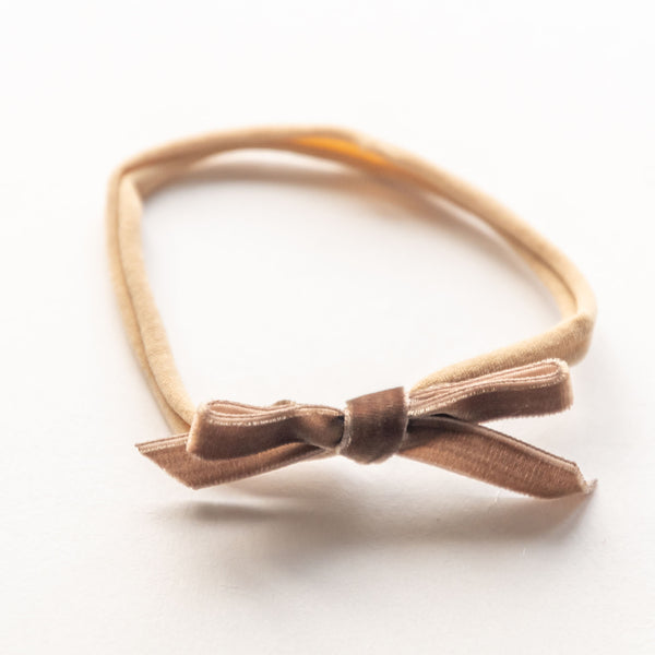 brown bow elastic headband made of velvet