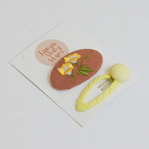 brown and lime embroidered hair snap clips with  display card