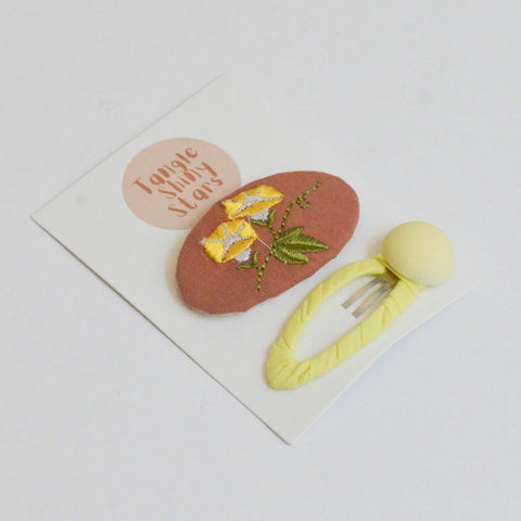 brown and lime embroidered hair snap clips with  display card