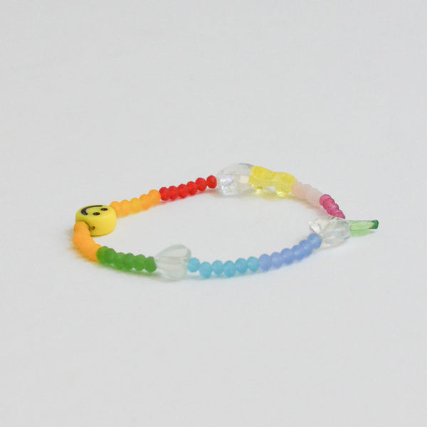 colorful glass beads bracelet with charms: smiley, heart, and flower