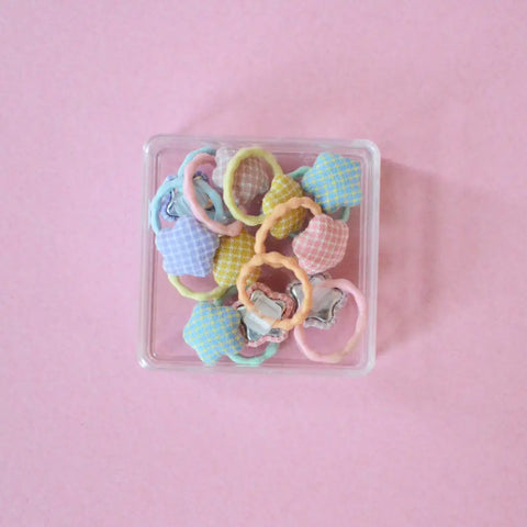 mini star with polka dots hair ties in a box