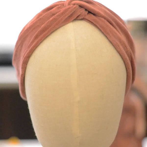 mannequin with twisted velvet headband