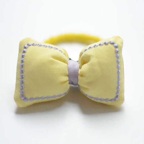 yellow puffed fabric bow hair tie 