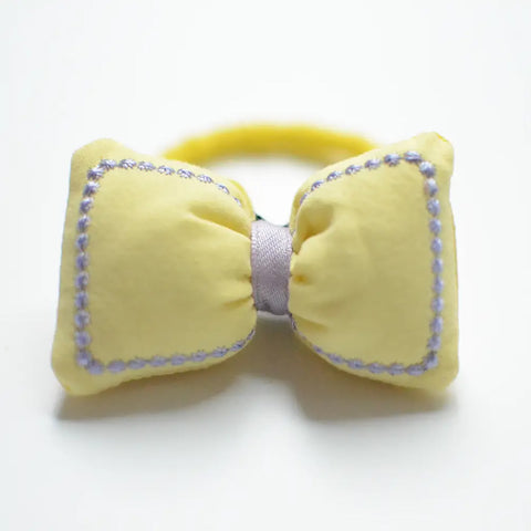 yellow puffed fabric bow hair tie 